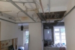 Tonbridge - Metal frame ceiling to cover existing wiring/pipework, before